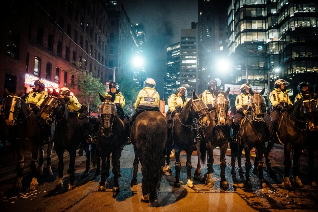 Beyond the Headlines: The Enduring Impact and Legacy of Protests in California and Los Angeles group of policemen on horse