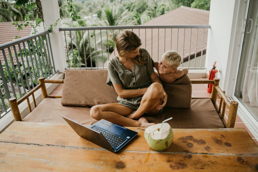 mother and son sitting on a sofa